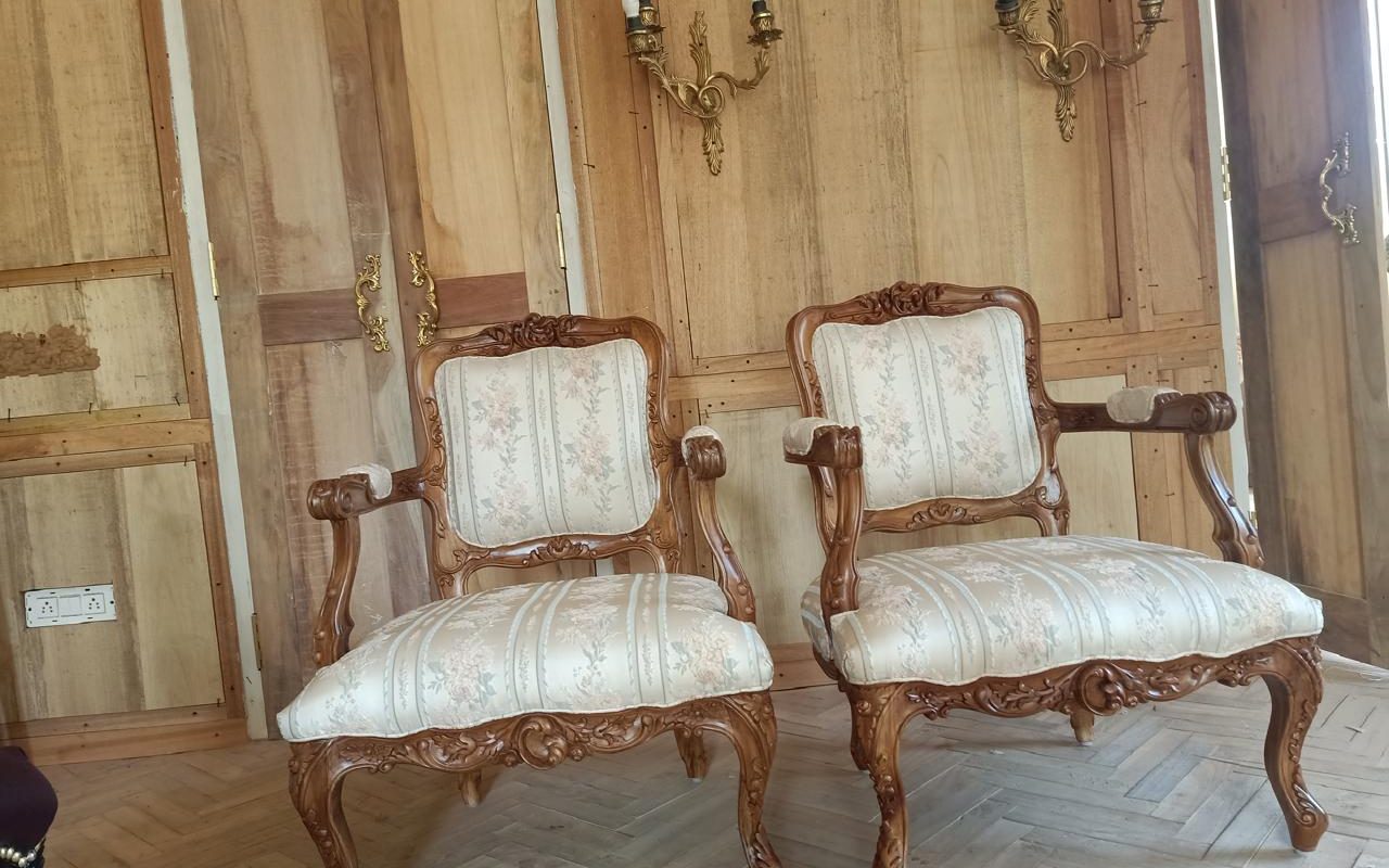 Pair of carved bergere armchairs in ivory damask made to order by ELEVE in Dubai