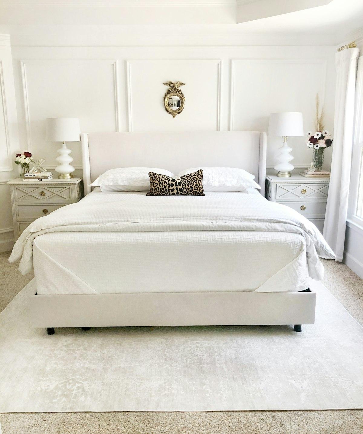 Grand tufted emperor bed with crystal button detailing