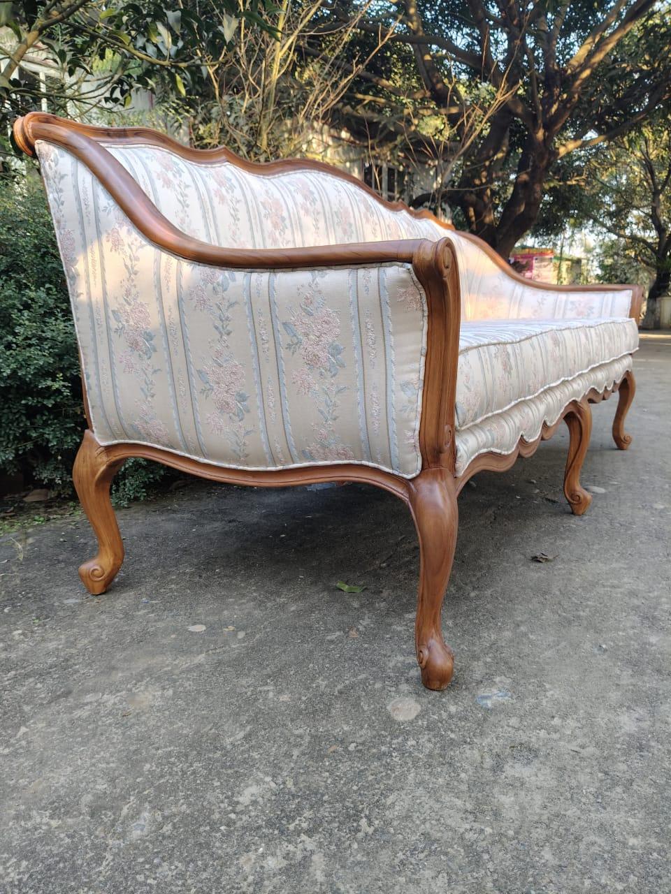 ELEV&Eacute; floral upholstered French Provincial sofa with carved wooden frame